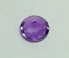 Purple faceted stone
